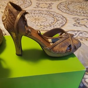 Beautiful gold t-strap shoes